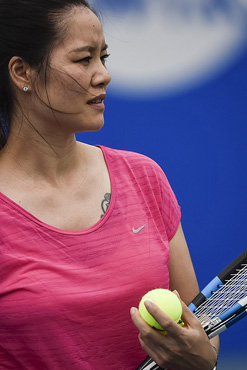 To go with Tennis-CHN-China-Li,FOCUS by Annanel Symington In this photo taken on September 29, 2015, former tennis player Li Na of China gives a tennis master class at the Wuhan Open tennis tournament in Wuhan, central China's Hubei province. Li Na's Grand Slam wins did miraculous things for tennis in China but a cultural shift away from central planning towards individual development is needed if the country is to emerge as a powerhouse, experts say. AFP PHOTO / FRED DUFOUR        (Photo credit should read FRED DUFOUR/AFP/Getty Images)