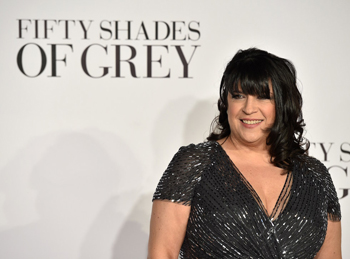 British author E.L James poses for photographers ahead of the UK Premiere of 'Fifty Shades of Grey' in central London on February 12, 2015. AFP PHOTO / LEON NEAL        (Photo credit should read LEON NEAL/AFP/Getty Images)
